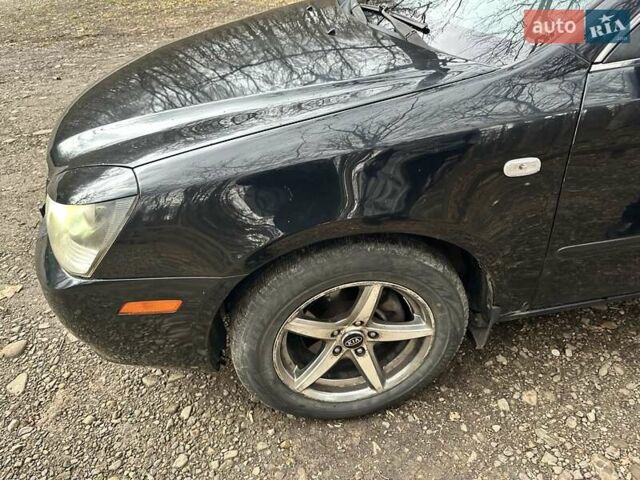 Чорний Кіа Маджентіс, об'ємом двигуна 2.66 л та пробігом 218 тис. км за 4600 $, фото 10 на Automoto.ua