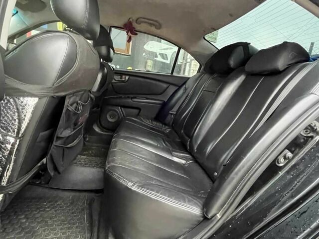 Черный Киа Маджентис, объемом двигателя 2.7 л и пробегом 219 тыс. км за 4600 $, фото 21 на Automoto.ua