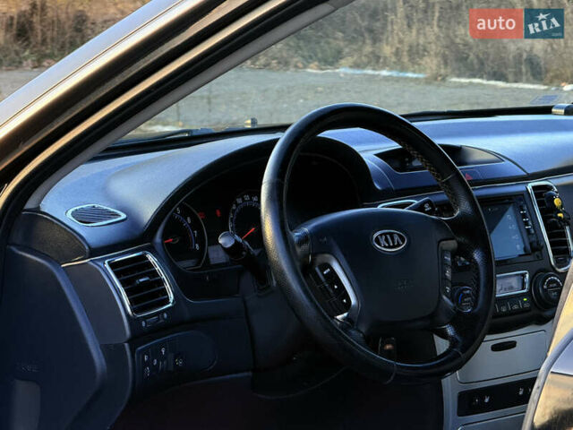 Черный Киа Маджентис, объемом двигателя 2 л и пробегом 305 тыс. км за 5400 $, фото 12 на Automoto.ua