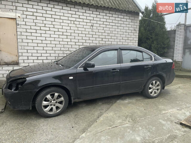 Черный Киа Маджентис, объемом двигателя 2 л и пробегом 366 тыс. км за 4000 $, фото 1 на Automoto.ua