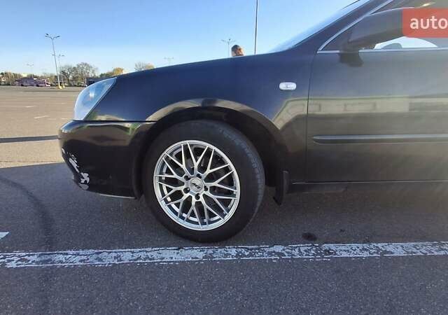 Чорний Кіа Маджентіс, об'ємом двигуна 2 л та пробігом 373 тис. км за 4500 $, фото 11 на Automoto.ua