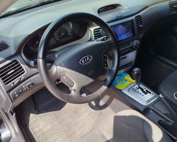 Черный Киа Маджентис, объемом двигателя 2 л и пробегом 265 тыс. км за 4800 $, фото 15 на Automoto.ua