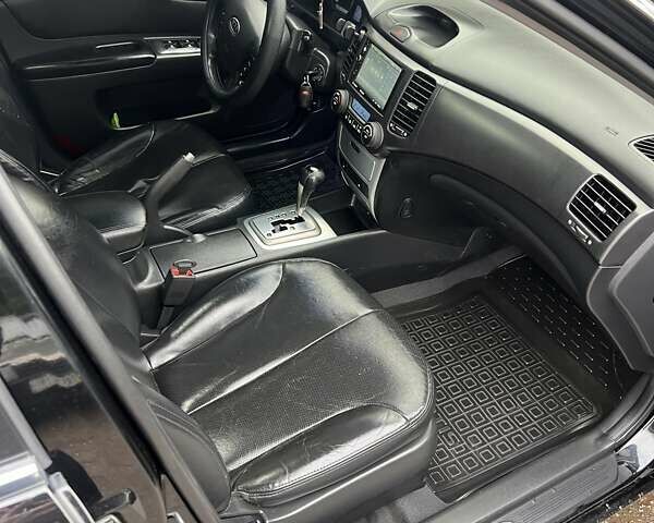 Черный Киа Маджентис, объемом двигателя 2 л и пробегом 258 тыс. км за 5500 $, фото 19 на Automoto.ua