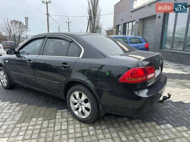 Чорний Кіа Маджентіс, об'ємом двигуна 2 л та пробігом 302 тис. км за 5800 $, фото 8 на Automoto.ua