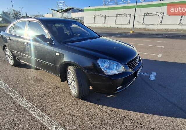 Чорний Кіа Маджентіс, об'ємом двигуна 2 л та пробігом 373 тис. км за 4500 $, фото 7 на Automoto.ua