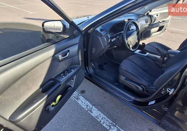 Чорний Кіа Маджентіс, об'ємом двигуна 2 л та пробігом 373 тис. км за 4500 $, фото 8 на Automoto.ua