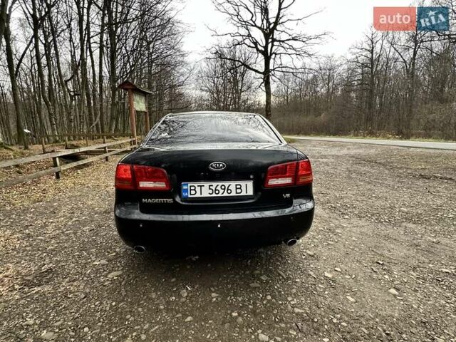 Чорний Кіа Маджентіс, об'ємом двигуна 2.66 л та пробігом 218 тис. км за 4600 $, фото 5 на Automoto.ua
