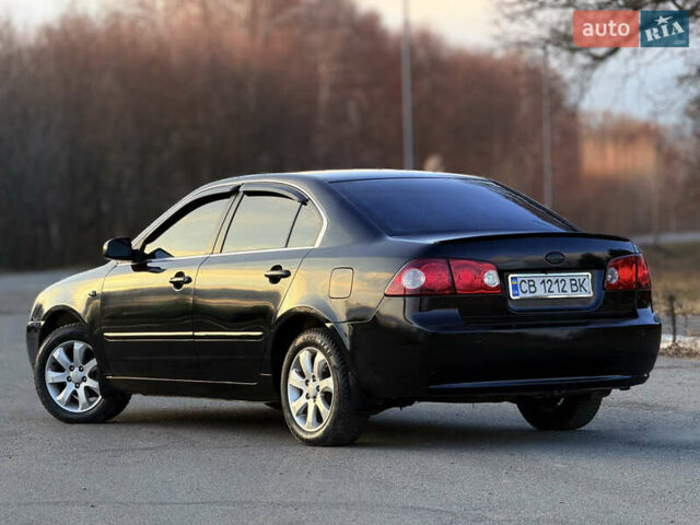 Черный Киа Маджентис, объемом двигателя 2 л и пробегом 305 тыс. км за 5400 $, фото 5 на Automoto.ua