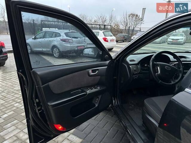 Чорний Кіа Маджентіс, об'ємом двигуна 2 л та пробігом 302 тис. км за 5800 $, фото 11 на Automoto.ua