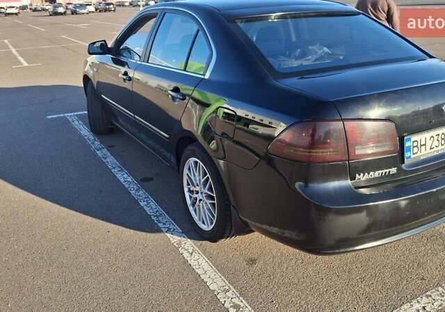 Чорний Кіа Маджентіс, об'ємом двигуна 2 л та пробігом 373 тис. км за 4500 $, фото 4 на Automoto.ua