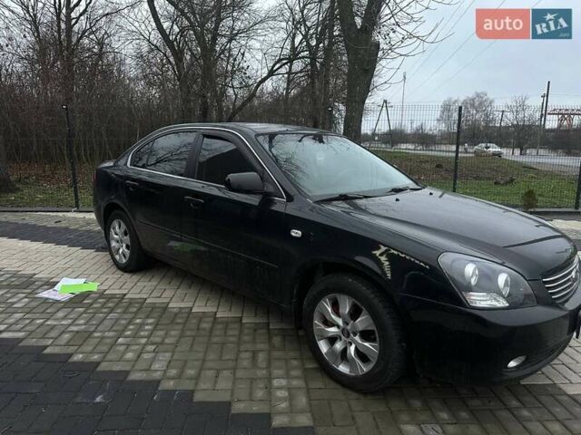 Чорний Кіа Маджентіс, об'ємом двигуна 2 л та пробігом 302 тис. км за 5800 $, фото 3 на Automoto.ua