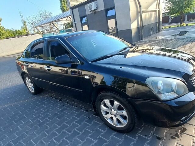 Черный Киа Маджентис, объемом двигателя 2 л и пробегом 180 тыс. км за 4800 $, фото 5 на Automoto.ua