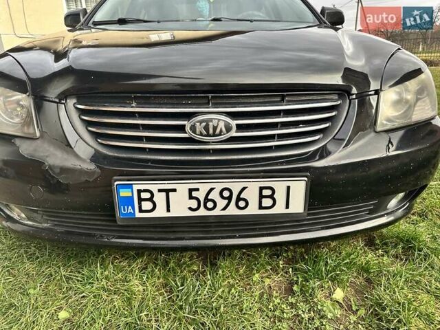 Чорний Кіа Маджентіс, об'ємом двигуна 2.66 л та пробігом 218 тис. км за 4600 $, фото 2 на Automoto.ua