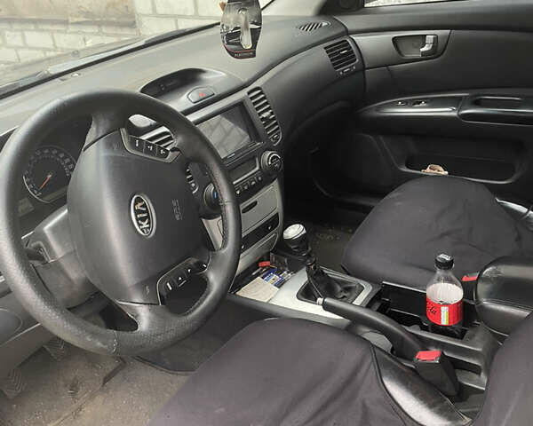 Черный Киа Маджентис, объемом двигателя 2 л и пробегом 366 тыс. км за 4000 $, фото 4 на Automoto.ua