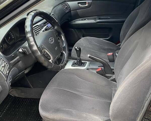 Чорний Кіа Маджентіс, об'ємом двигуна 2 л та пробігом 165 тис. км за 5200 $, фото 7 на Automoto.ua