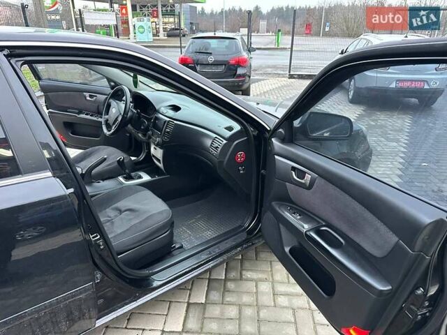 Чорний Кіа Маджентіс, об'ємом двигуна 2 л та пробігом 302 тис. км за 5800 $, фото 30 на Automoto.ua