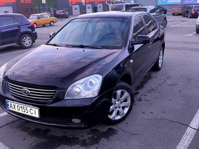 Черный Киа Маджентис, объемом двигателя 2 л и пробегом 200 тыс. км за 4500 $, фото 1 на Automoto.ua