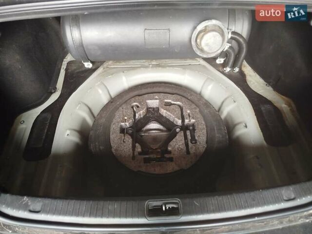 Черный Киа Маджентис, объемом двигателя 2 л и пробегом 265 тыс. км за 4800 $, фото 2 на Automoto.ua