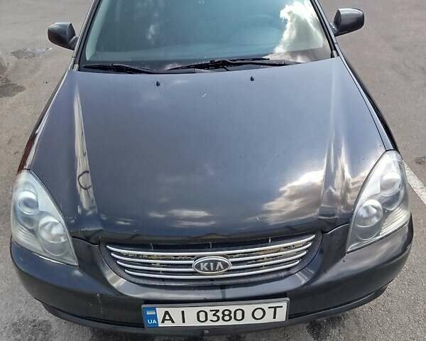 Черный Киа Маджентис, объемом двигателя 2 л и пробегом 265 тыс. км за 4800 $, фото 24 на Automoto.ua