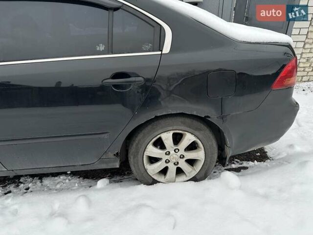 Черный Киа Маджентис, объемом двигателя 2 л и пробегом 270 тыс. км за 4200 $, фото 4 на Automoto.ua