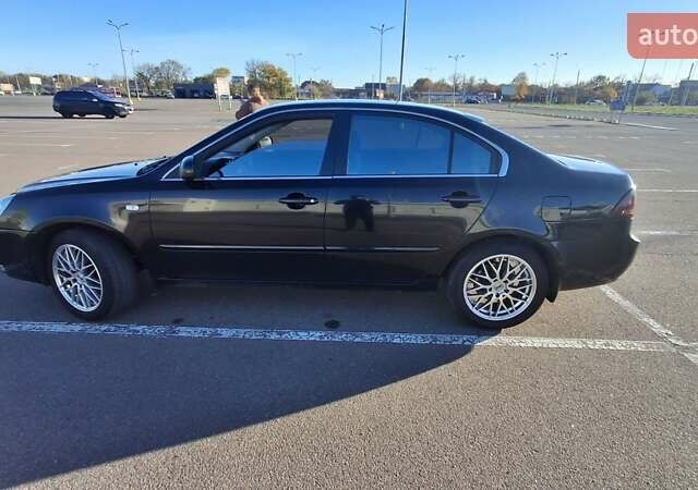 Чорний Кіа Маджентіс, об'ємом двигуна 2 л та пробігом 373 тис. км за 4500 $, фото 1 на Automoto.ua