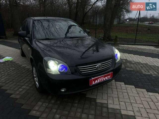 Чорний Кіа Маджентіс, об'ємом двигуна 2 л та пробігом 302 тис. км за 5800 $, фото 40 на Automoto.ua