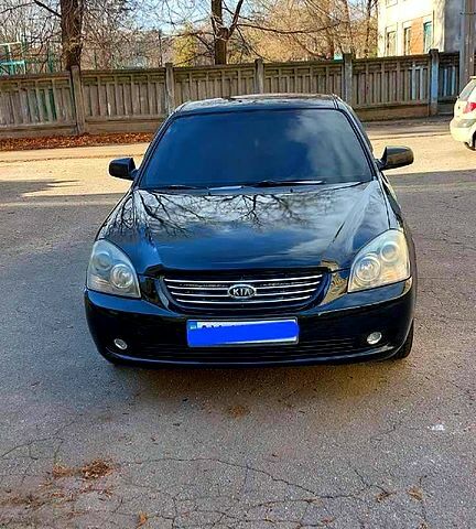 Черный Киа Маджентис, объемом двигателя 2 л и пробегом 208 тыс. км за 5700 $, фото 2 на Automoto.ua