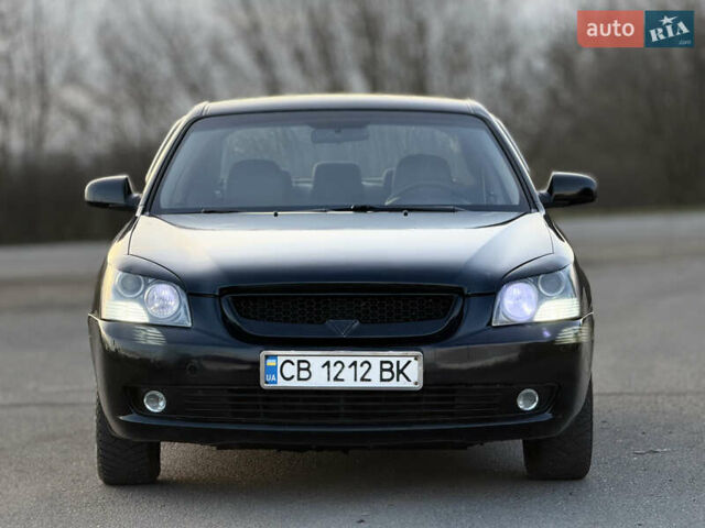 Черный Киа Маджентис, объемом двигателя 2 л и пробегом 305 тыс. км за 5400 $, фото 2 на Automoto.ua