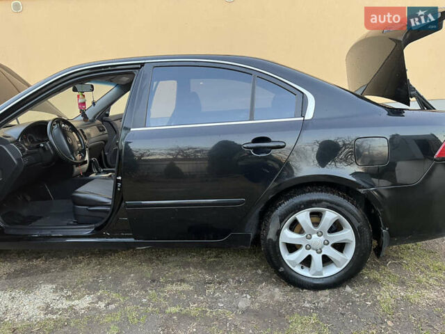 Чорний Кіа Маджентіс, об'ємом двигуна 2 л та пробігом 200 тис. км за 4650 $, фото 1 на Automoto.ua