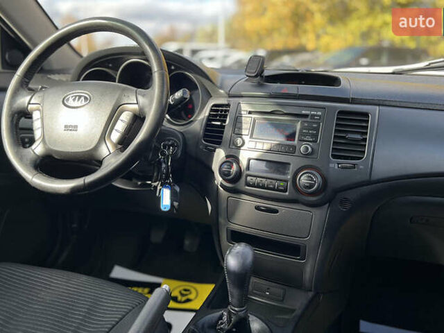 Чорний Кіа Маджентіс, об'ємом двигуна 2 л та пробігом 174 тис. км за 4800 $, фото 7 на Automoto.ua