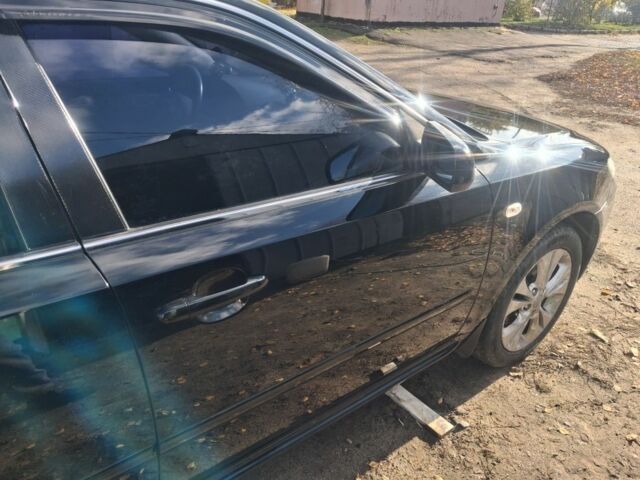 Чорний Кіа Маджентіс, об'ємом двигуна 2 л та пробігом 222 тис. км за 6500 $, фото 3 на Automoto.ua