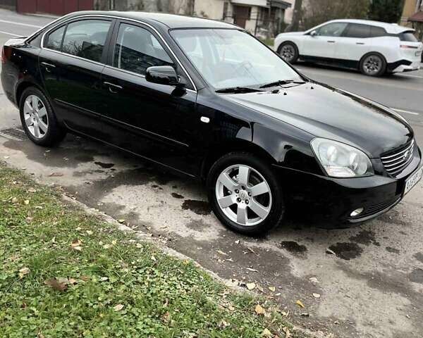 Чорний Кіа Маджентіс, об'ємом двигуна 2.7 л та пробігом 280 тис. км за 6500 $, фото 31 на Automoto.ua