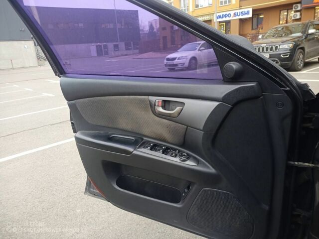 Черный Киа Маджентис, объемом двигателя 2 л и пробегом 335 тыс. км за 4000 $, фото 5 на Automoto.ua