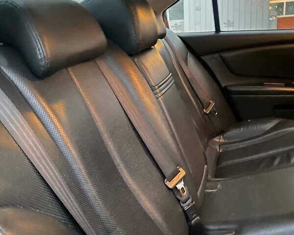 Черный Киа Маджентис, объемом двигателя 2 л и пробегом 208 тыс. км за 6400 $, фото 18 на Automoto.ua