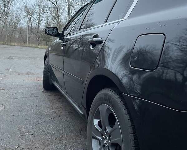 Черный Киа Маджентис, объемом двигателя 2 л и пробегом 222 тыс. км за 7200 $, фото 1 на Automoto.ua