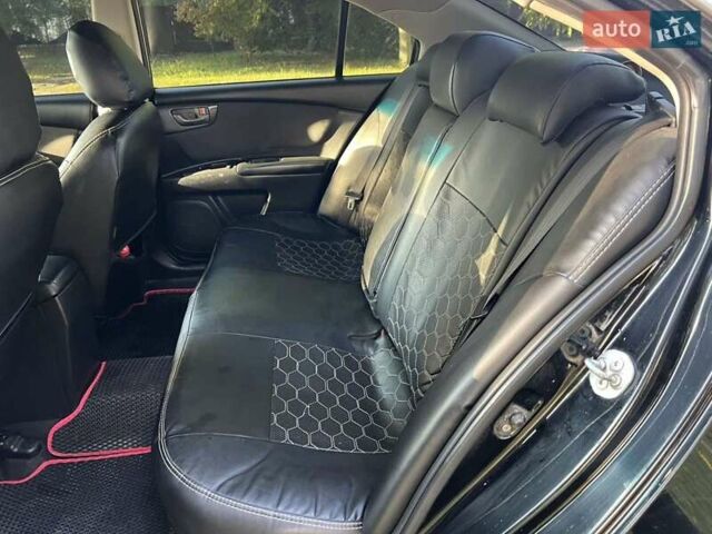 Чорний Кіа Маджентіс, об'ємом двигуна 2 л та пробігом 227 тис. км за 5650 $, фото 16 на Automoto.ua