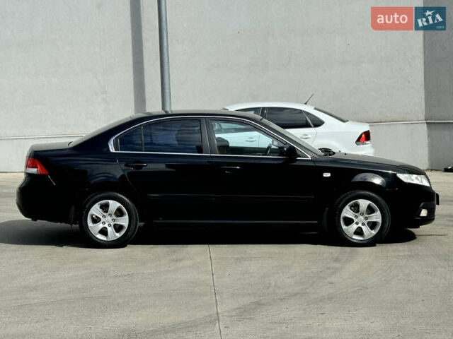 Черный Киа Маджентис, объемом двигателя 2 л и пробегом 220 тыс. км за 7500 $, фото 3 на Automoto.ua