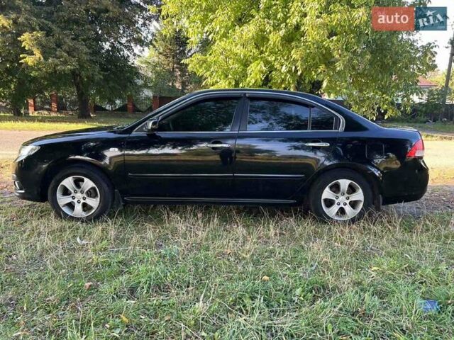 Чорний Кіа Маджентіс, об'ємом двигуна 2 л та пробігом 227 тис. км за 5650 $, фото 3 на Automoto.ua