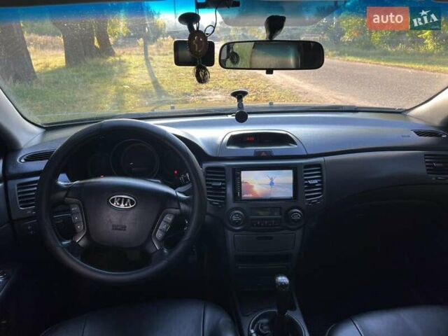 Чорний Кіа Маджентіс, об'ємом двигуна 2 л та пробігом 227 тис. км за 5650 $, фото 12 на Automoto.ua