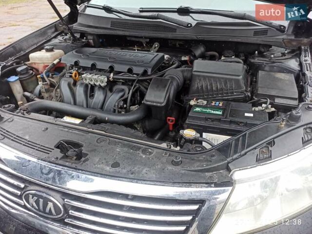Черный Киа Маджентис, объемом двигателя 2 л и пробегом 226 тыс. км за 5500 $, фото 4 на Automoto.ua