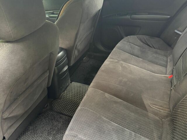 Черный Киа Маджентис, объемом двигателя 2 л и пробегом 300 тыс. км за 4501 $, фото 6 на Automoto.ua