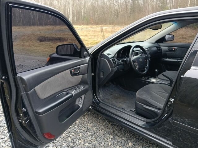 Чорний Кіа Маджентіс, об'ємом двигуна 2 л та пробігом 212 тис. км за 4950 $, фото 7 на Automoto.ua