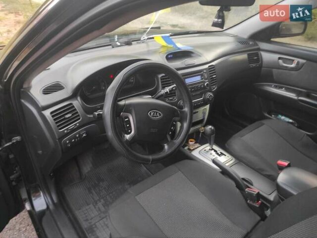 Черный Киа Маджентис, объемом двигателя 2 л и пробегом 228 тыс. км за 5500 $, фото 1 на Automoto.ua
