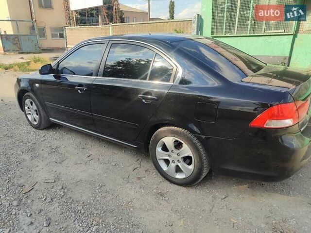 Черный Киа Маджентис, объемом двигателя 2 л и пробегом 257 тыс. км за 6500 $, фото 8 на Automoto.ua