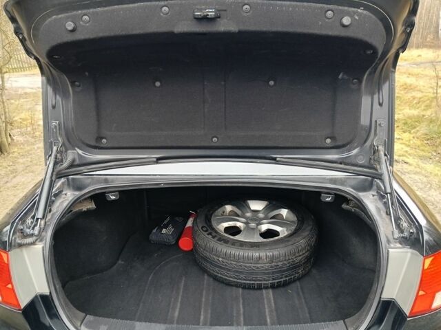 Чорний Кіа Маджентіс, об'ємом двигуна 2 л та пробігом 212 тис. км за 4950 $, фото 15 на Automoto.ua