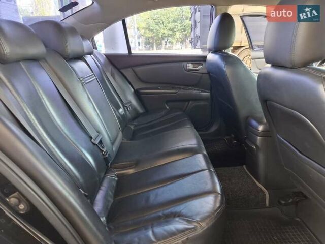Чорний Кіа Маджентіс, об'ємом двигуна 2 л та пробігом 192 тис. км за 6600 $, фото 17 на Automoto.ua