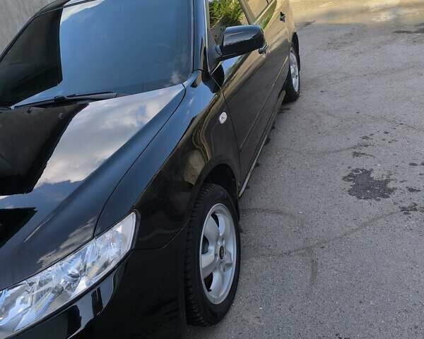 Черный Киа Маджентис, объемом двигателя 2 л и пробегом 263 тыс. км за 6500 $, фото 3 на Automoto.ua