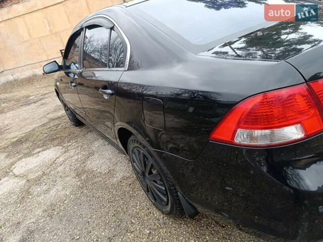 Черный Киа Маджентис, объемом двигателя 2 л и пробегом 167 тыс. км за 6100 $, фото 5 на Automoto.ua