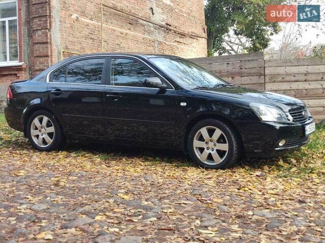 Чорний Кіа Маджентіс, об'ємом двигуна 2.66 л та пробігом 264 тис. км за 5199 $, фото 5 на Automoto.ua