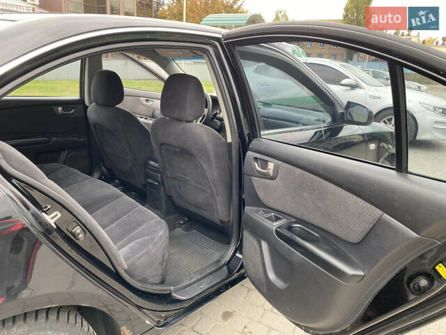 Черный Киа Маджентис, объемом двигателя 2 л и пробегом 239 тыс. км за 5200 $, фото 8 на Automoto.ua